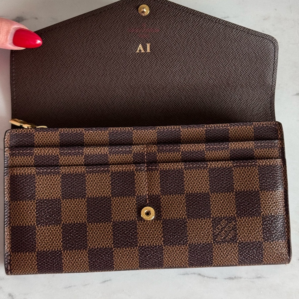 Sarah Louis Vuitton Wallet (Monogrammed on the side).
